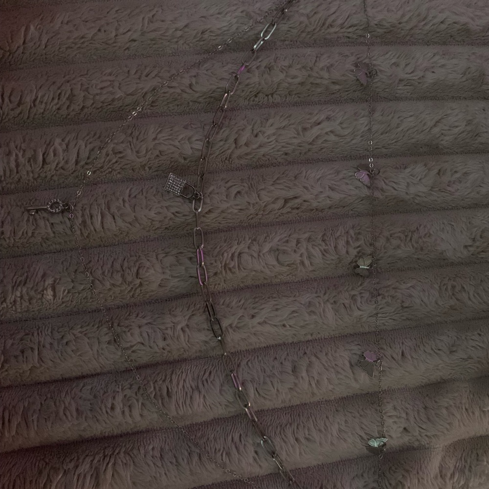 Silver Triple Chain Necklace With Key, Lock, And Butterfly Charms